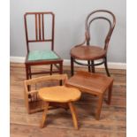 A collection of furniture. Includes two chairs, small table, stool and a magazine rack.