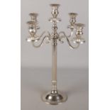 A large silver plate four branch candelabra.