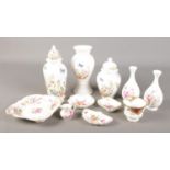 A collection of bone china. Includes Royal Crown Derby, Royal Albert, Aynsley and Coalport.