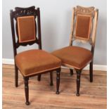 Two Victorian carved mahogany dining chairs. One part stripped.