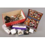 A box of costume jewellery. Includes Pandora style bracelets, necklaces, earrings etc.