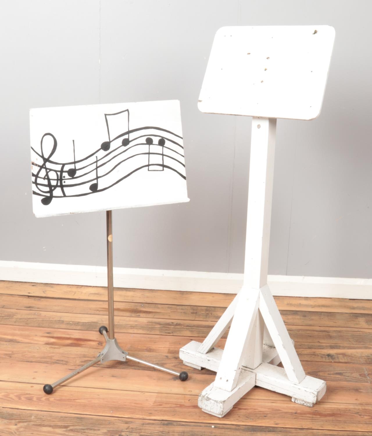 A painted pine board on stand along with a painted music stand with metal base.