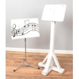 A painted pine board on stand along with a painted music stand with metal base.