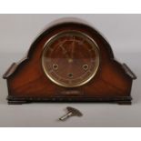 A Smiths Westminster mantel clock with instructions and key.