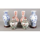 Three pairs of oriental vases, to include large blue and white baluster and lidded examples. Marks