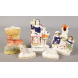 Five Staffordshire style figures. Includes pair of sheep, flat back figures etc.