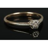 A 9ct Gold Diamond solitaire ring. Size S. Total weight: 2.13g.