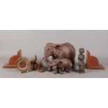 A collection of mostly woodenwares. To include pair of bookends, extensively carved circular