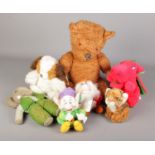 A box of soft toys. Includes vintage mohair jointed bear with growler etc.