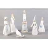 Six porcelain figures. Includes one Lladro, three Nao etc.