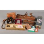 A box of miscellaneous. Includes Zenith binoculars, hip flask, wood working tools etc.