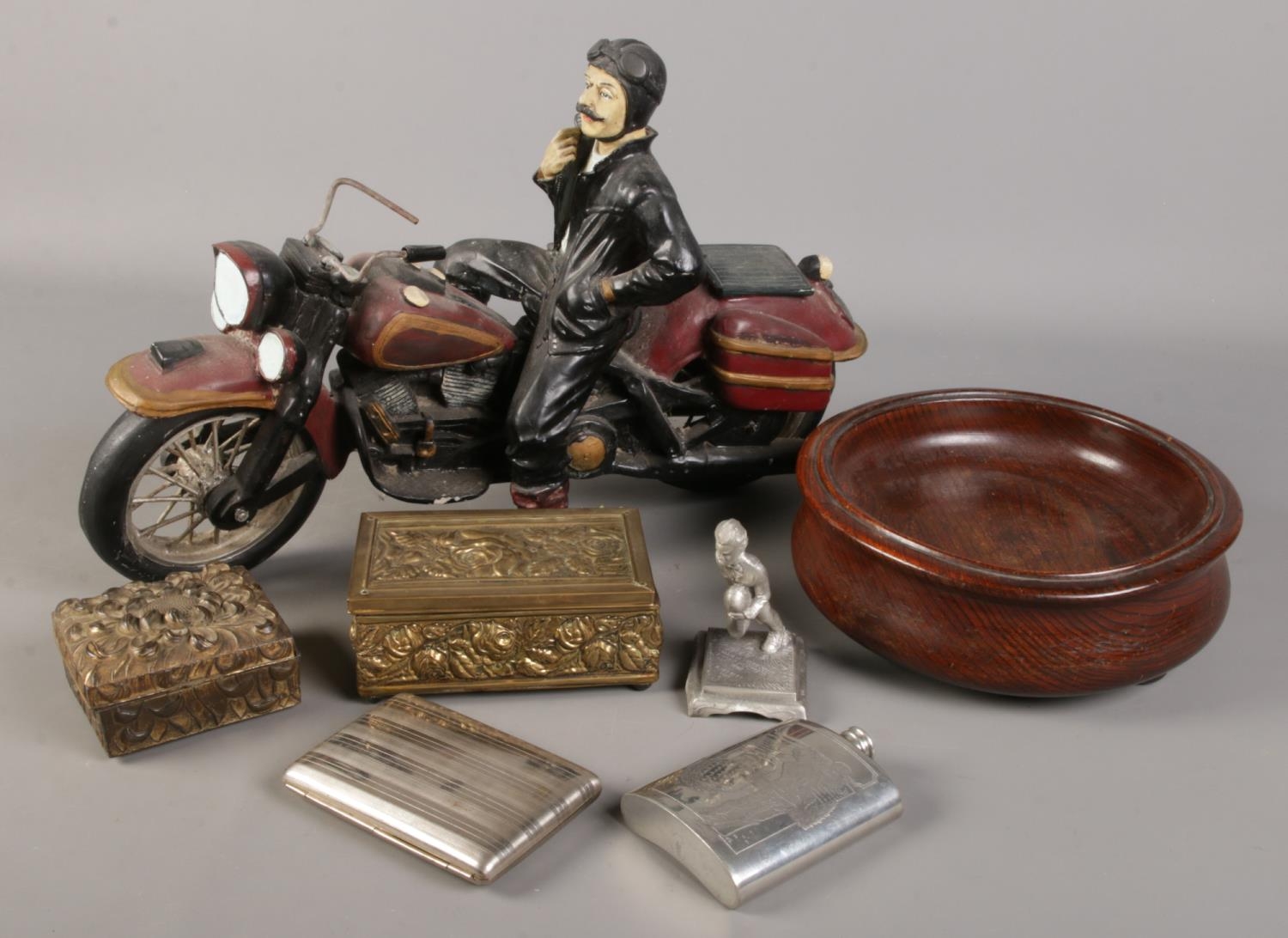 A quantity of collectables. Includes large composite motor biker, wooden bowl, cigarette case etc.