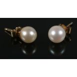 A pair of 9ct gold pearl ear studs.