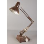 A vintage Swedish anglepoise lamp with enamel shade.