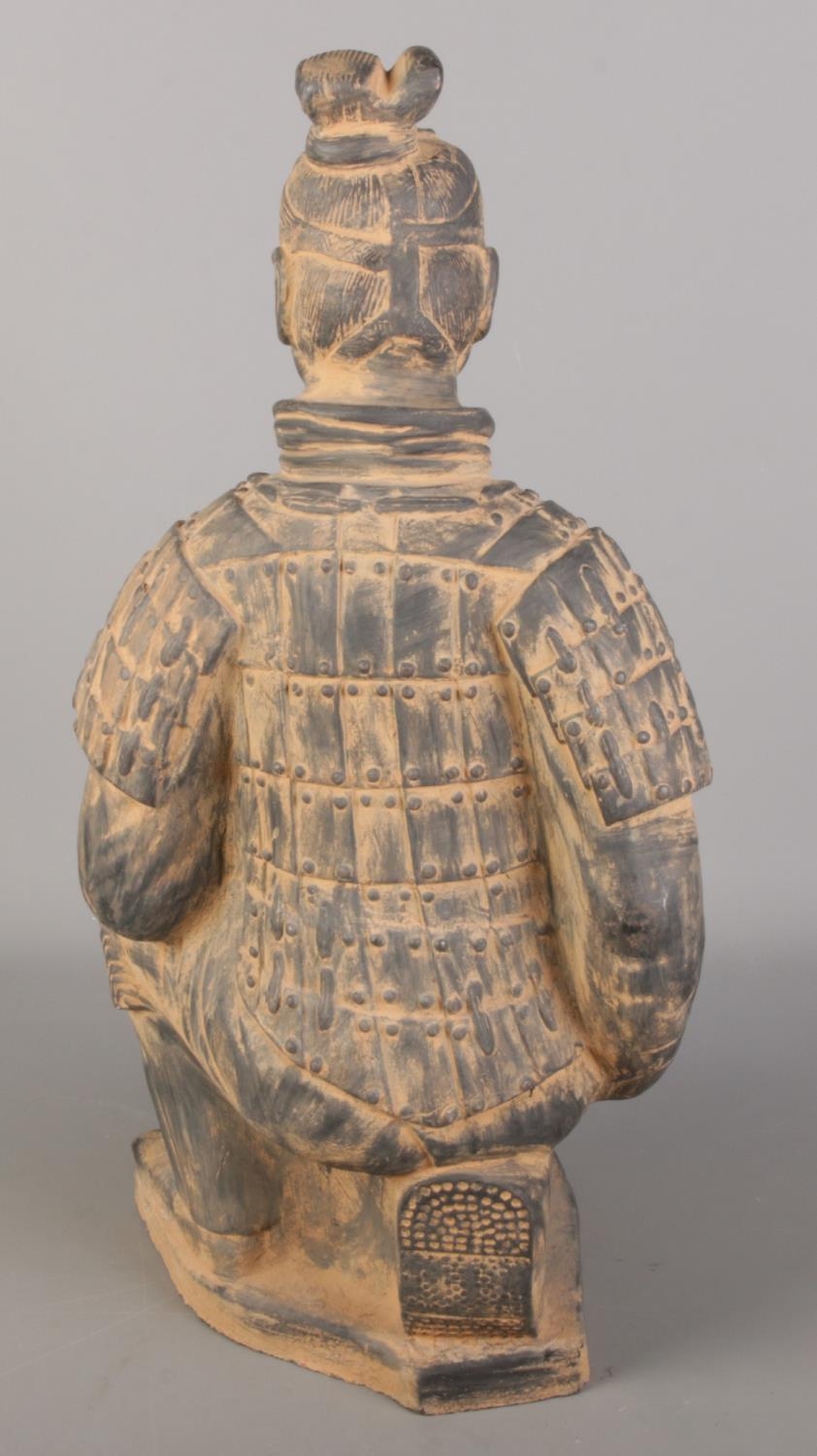 A Chinese terracotta army seated figure. (61cm x 30cm) - Image 2 of 2