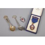 A 5 Years Distinguished Service medal, together with an Essex Country Rifle Association fob and