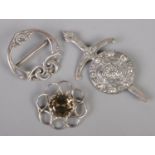 Three Scottish silver brooches. Includes Robert Allison and Ola M Gorie examples.