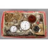 A tray of vintage costume jewellery. Includes silver pocket and fob watch, RAF badges etc.