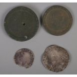 Four antique coins. Including silver Elizabethan coin, Georgian wheel penny, etc.