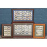 Four framed cigarette card displays, featuring Lambert and Butler cigarette cards.