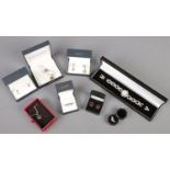 A collection of boxed silver jewellery. Includes Accurist wristwatch, earrings, necklace etc.