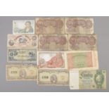 A quantity of banknotes. Including two Bank of Korea 500 hwan notes, Reichmark 50 banknote, 20,000
