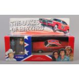 Corgi - A Dukes of Hazzard set consisting of a 1:36 scale Dodge Charger and hand painted white metal