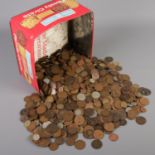 A large quantity of mostly British pre decimal coins. Including half crowns, pennies, three pence,