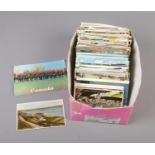 A box of assorted postcards containing both UK and international examples. (Approx. 500 cards)