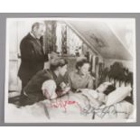 An autographed photograph from National Velvet. Signed by Elizabeth Taylor, Mickey Rooney and Anne