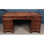 A large mahogany twin pedestal knee hole desk. With inset top. (77cm x 152cm x 90cm)