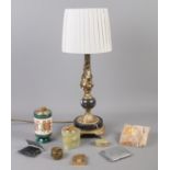 An assortment of collectables, to include mainly smoking related items. Includes table lamp, Calibri