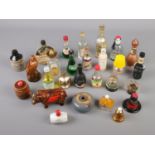A quantity of miniature bottles mainly in novelty shapes such as a Bear, Eagle and Bull. Several