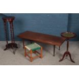 A teak Meredew Furniture coffee table along with a mahogany barley twist plant stand and mahogany