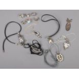 A collection of mainly silver jewellery. Includes bookmark, six dress rings and six pendant