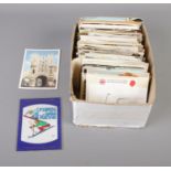 A box of assorted postcards containing both UK and international examples. (Approx. 500 cards)