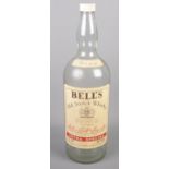 A empty 4.54L Bell's whisky bottle.
