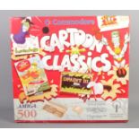 A boxed complete Commodore Amiga 500 console, in Cartoon Classics box. No games included.