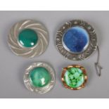 Four brooches. Includes three Ruskin style examples and a yellow metal enamel example.