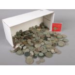 A large quantity of coins. Including half crowns, shillings, pennies, three pence, etc.