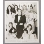 An autographed monochrome lobby card for Xanadu. Signed by Gene Kelly.