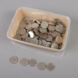 A box of US quarter dollars dating from the 1960's through to 1990's. Approx. 180 pieces.
