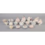 A collection of Dresden porcelain figurines featuring lacework dresses. (Approx. 17 figures)