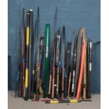 A large collection of fishing rods. Includes Shakespeare, Millbro etc.