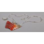 Two pieces of silver jewellery. Includes agate butterfly pendant on silver chain and a silver and