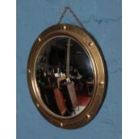 A gilt framed convex mirror: 37cm diameter.