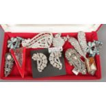 Twelve Art Deco dress clips, mainly paste set.