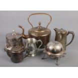 A collection of metalwares. Includes John Round & Son silverplate, copper kettle etc.