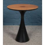 A Mid Twentieth Century Maurice Burke for Arkana black mushroom circular side table with teak top.