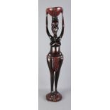A Tribal figured Smokers Stand. 74 cm in height.